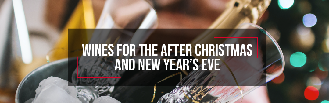 Bottle of sparkling wine chilling in an ice bucket beside a lit Christmas tree, with the title Wines for the after Christmas and New Year's Eve