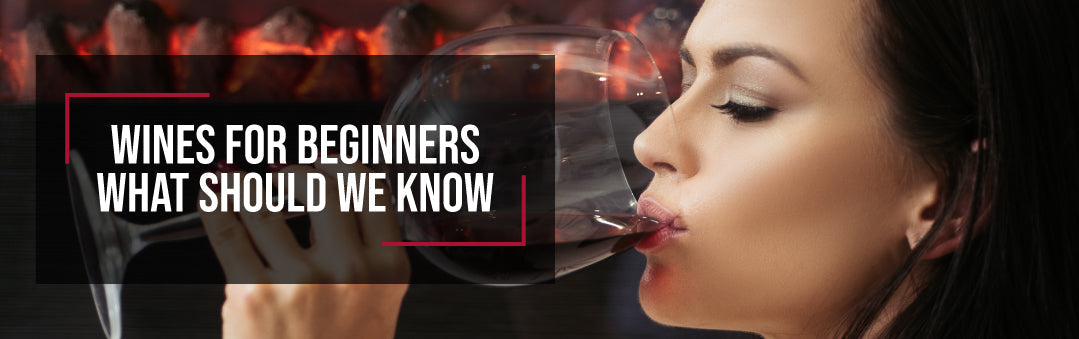 Woman drinking from a glass of red wine in profile, with the title Wines for beginners, what should we know